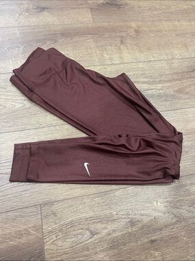 Nike Maroon/Burgundy Performance Leggings with White Swoosh